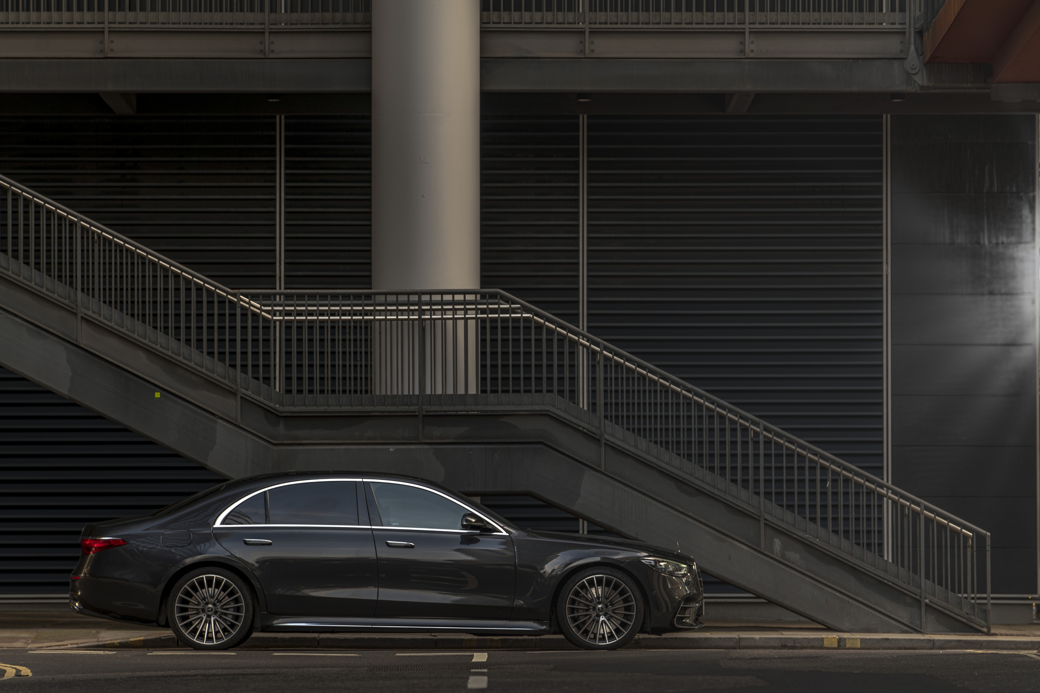 Mercedes-Benz S-Class side profile in urban setting