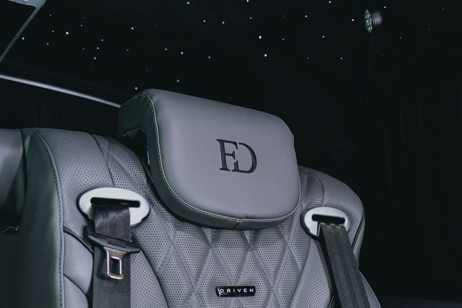 Fortius Driven monogrammed headrest and quilted leather seat detail